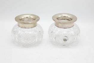 Pair of German 800 silver collared cut glass scent jars, 11cm high (2)