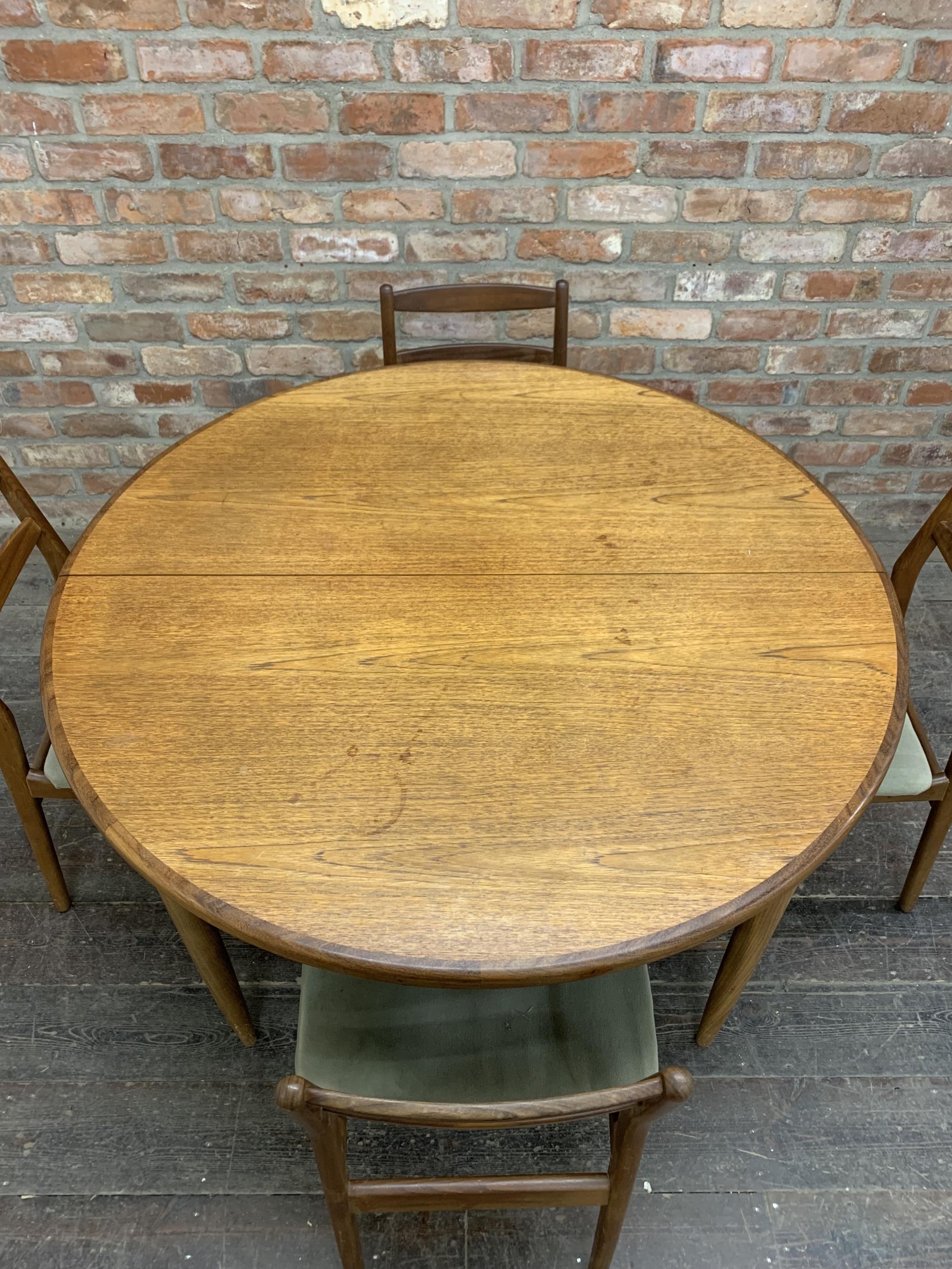 Mid 20th century G Plan teak circular extending dining table together with four chairs, H 73cm x W - Image 2 of 7