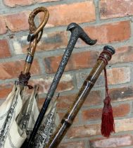 Three parasols with interesting silver applied handles (3)