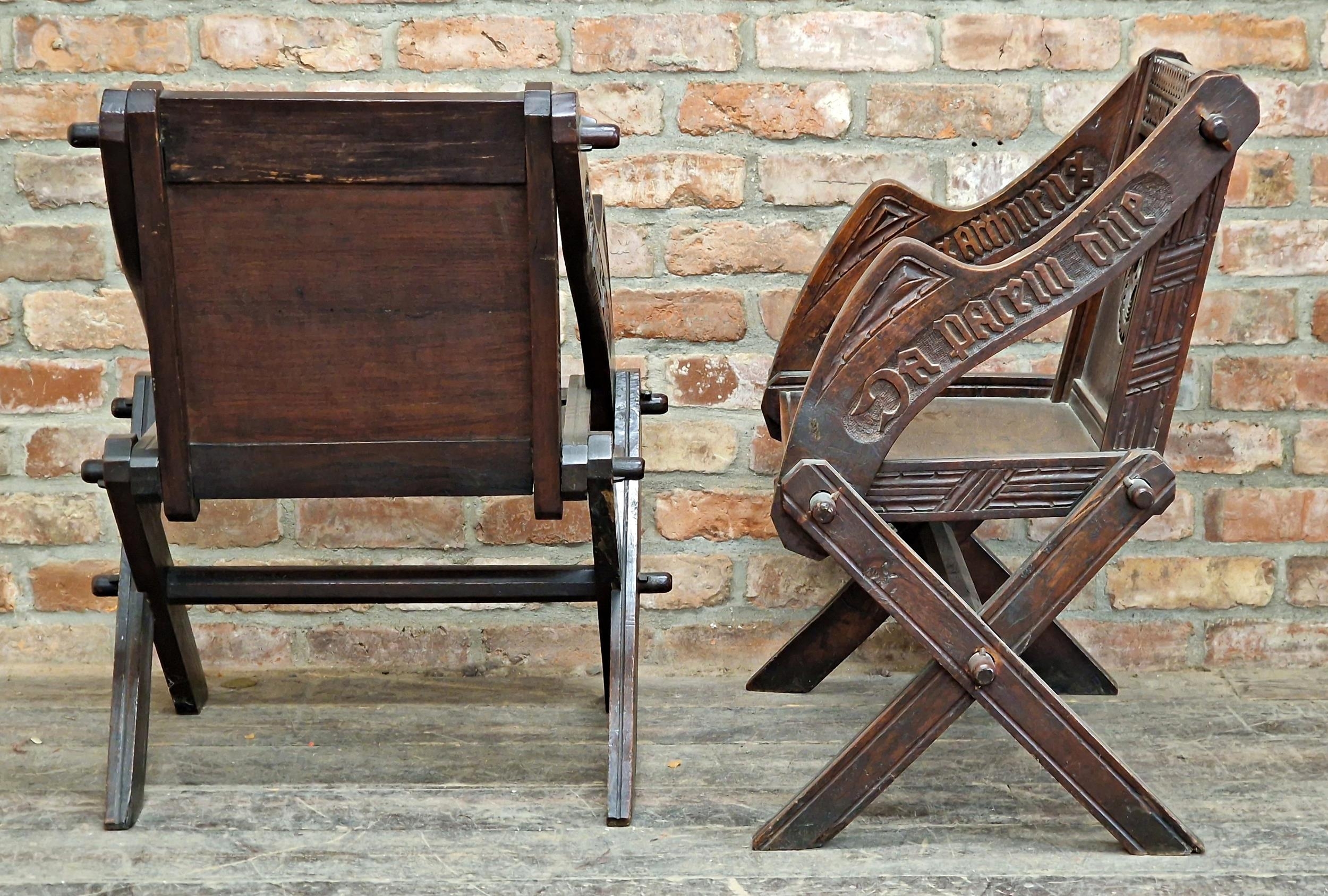 Good quality pair of 19th century carved oak Glastonbury chairs, carved inscriptions to back and - Image 5 of 5