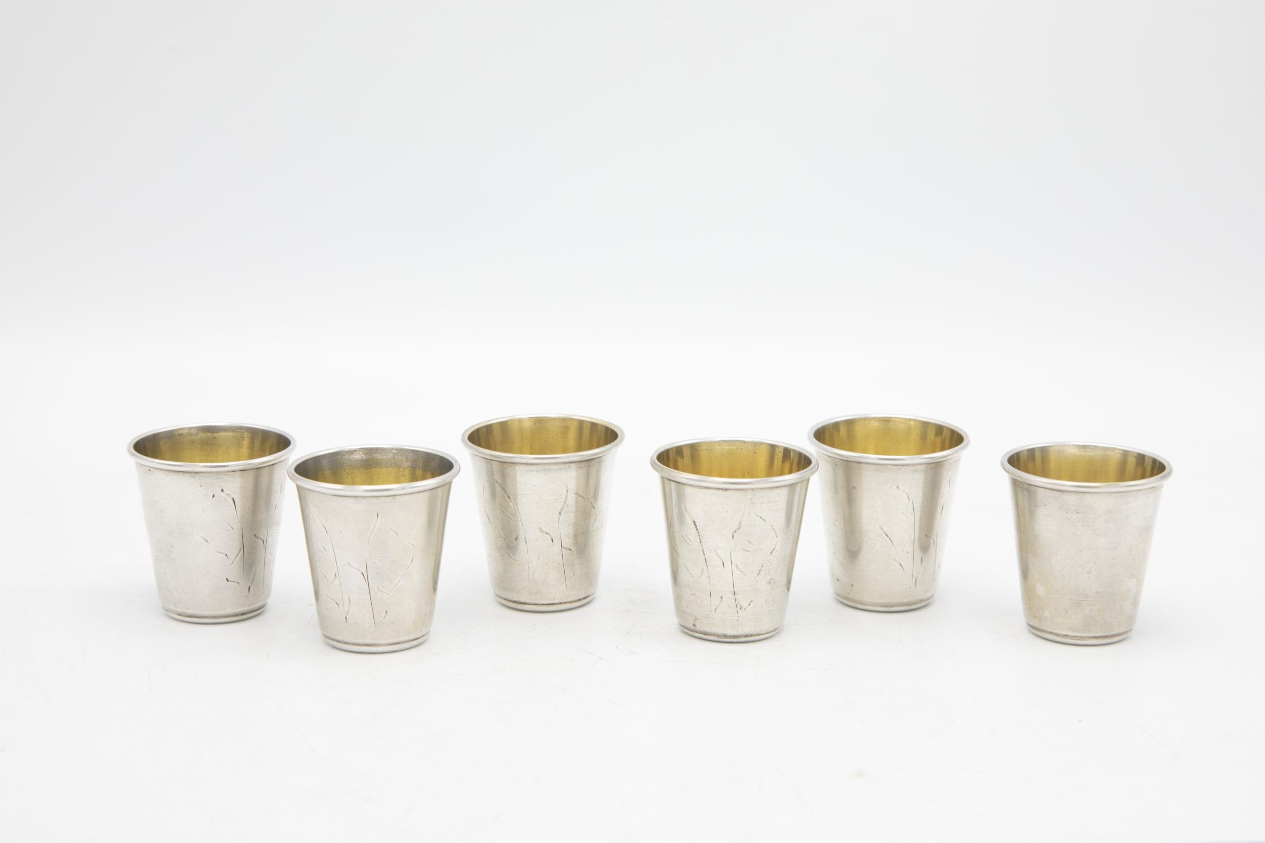 Set of six Russian silver Vodka tots with engraved decoration and gilt interiors, 4cm high, 3.5oz - Image 2 of 3