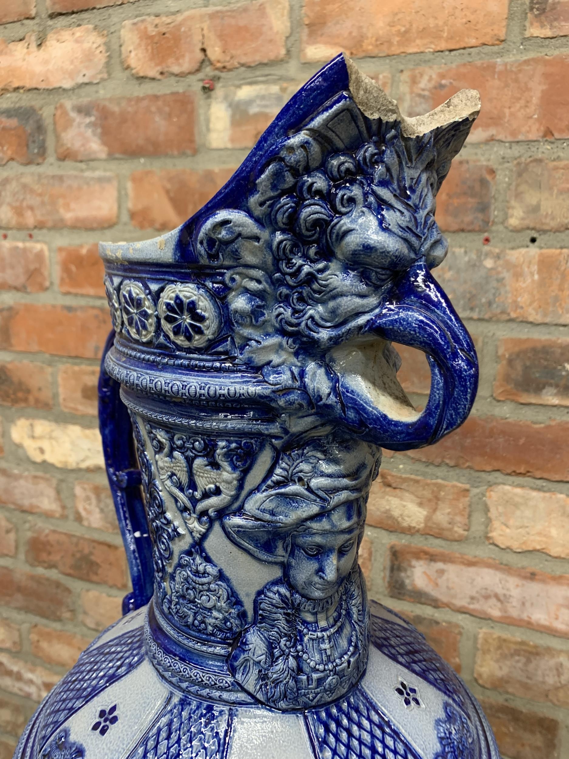 Very large Westerwald Rhineware exhibition blue and white ewer with ornate battlefield scene, H 86cm - Image 2 of 4