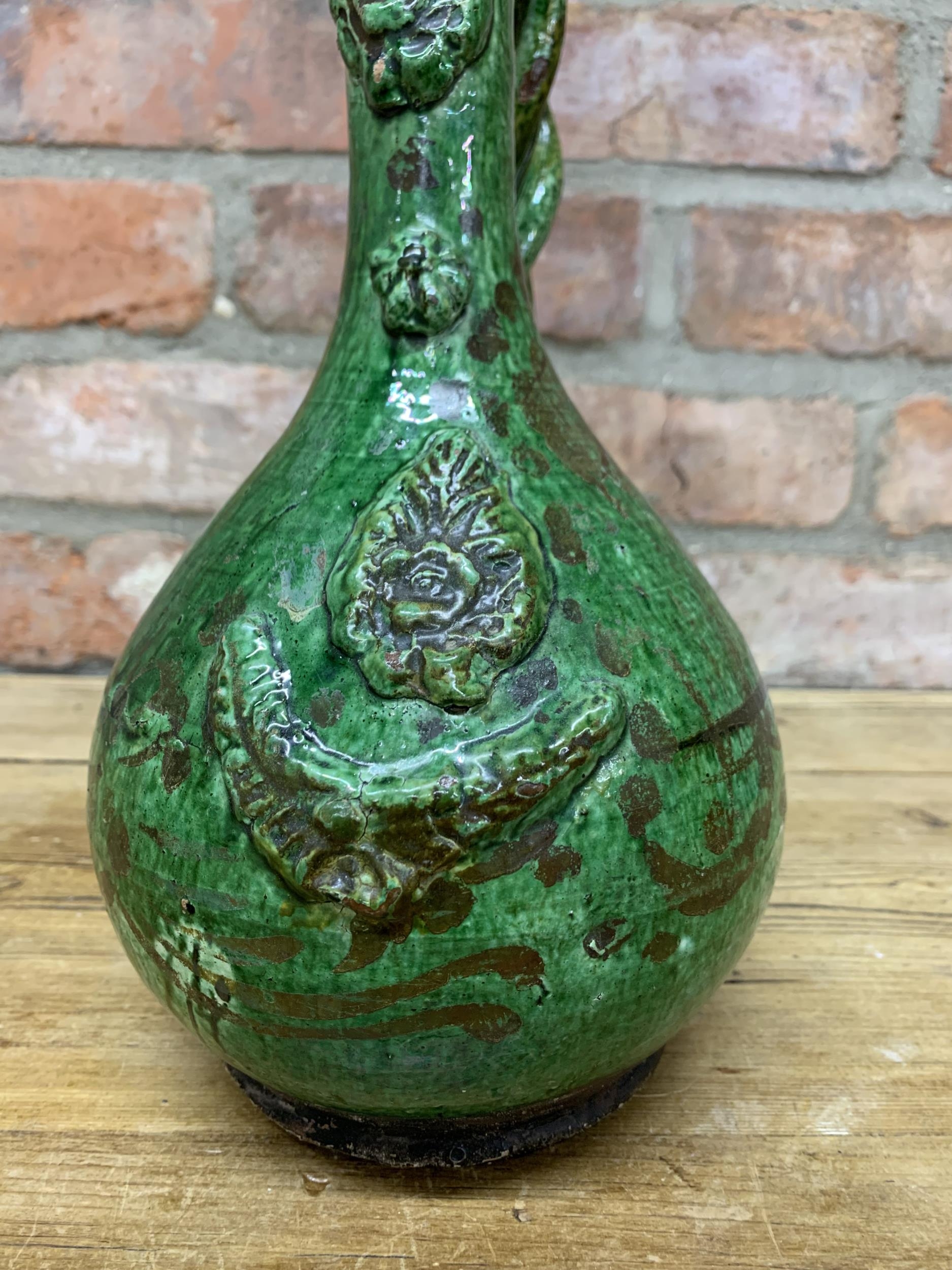 18th century Turkish Ottoman Canakkale pottery ewer with olive green glaze, bulbous body, long - Image 2 of 3