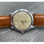 Vintage Girard Perregaux chrome gents watch, large 38mm case, champagne dial with gilt hands and