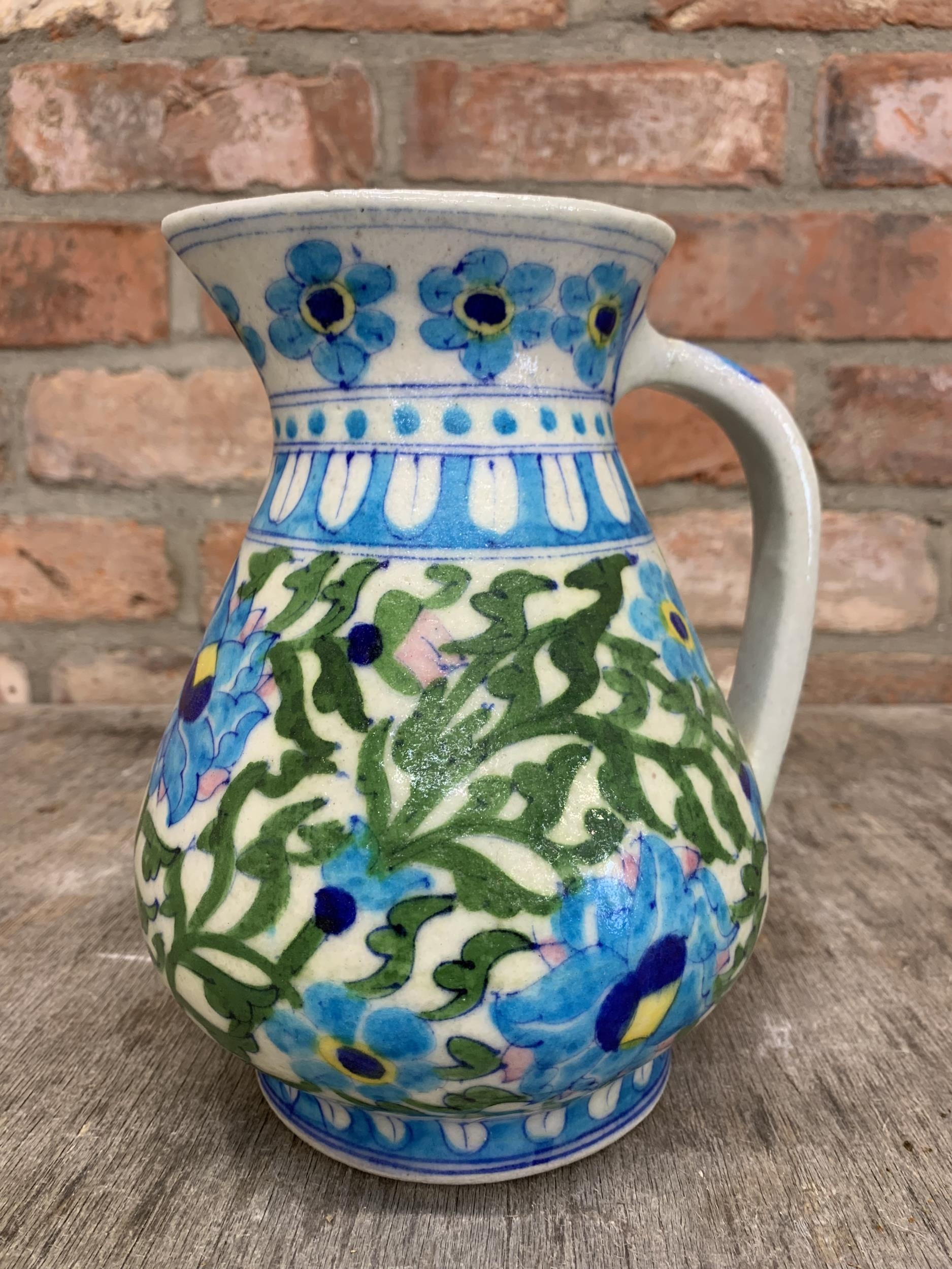 Antique Iznik pottery jug with typical scrolled foliate decoration, 20cm high, with further - Image 3 of 4