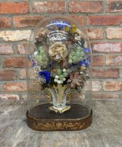 Antique faux floral diorama display in ceramic vase held within glass dome atop wooden inlaid