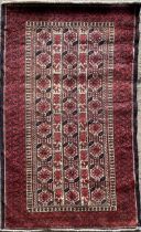 North East Persian Turkoman rug, geometric pattern, dark ground, 190 x 100cm