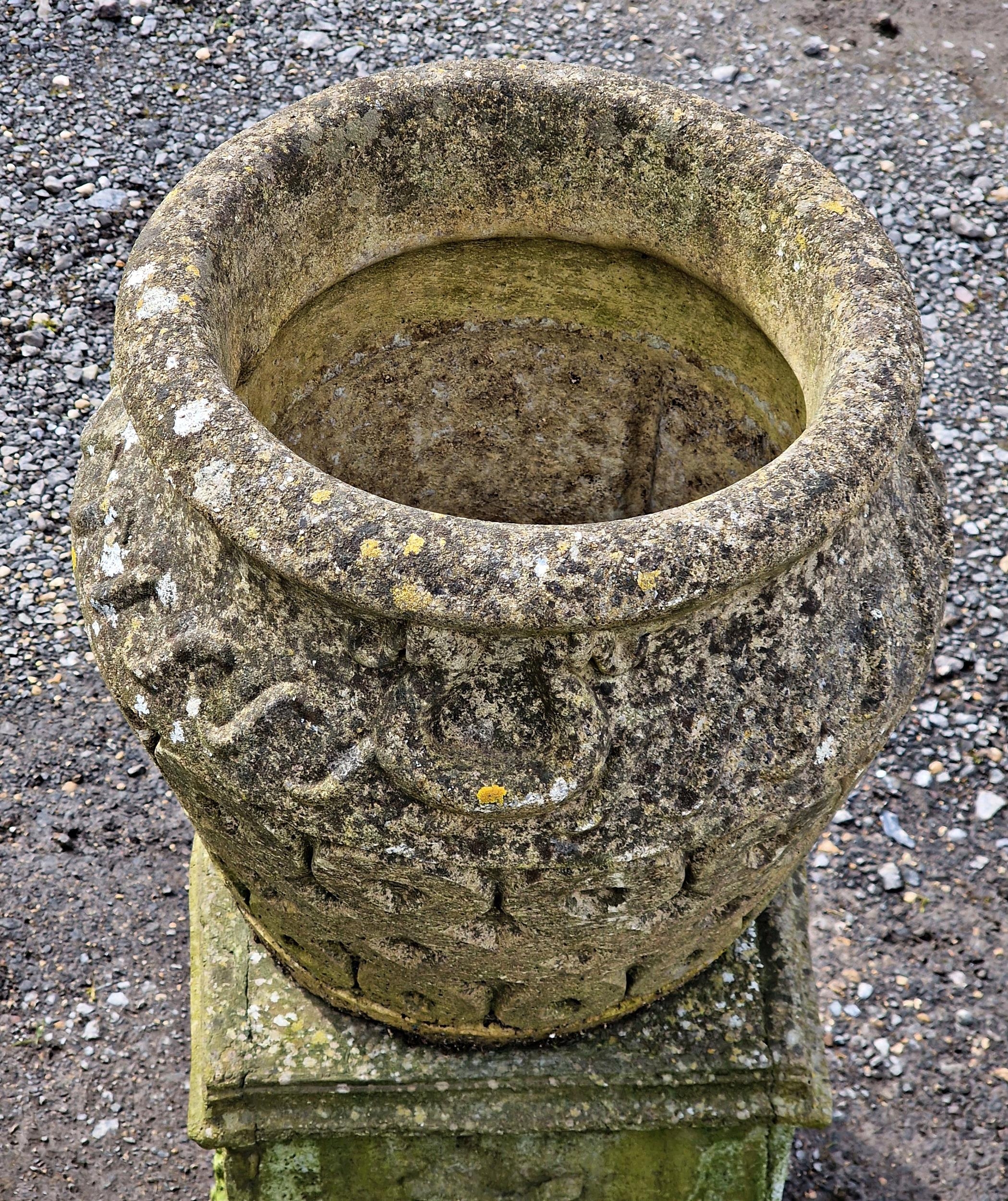 A weathered reconstituted stone garden planter with repeating lattice detail raised on a square - Image 3 of 3