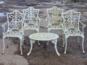 A set of four painted garden armchairs with pierced and scrolled detail, H 93cm, together with an