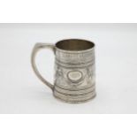 Good quality George III silver mug, embossed with masks and swags, maker Peter and William Bateman?,