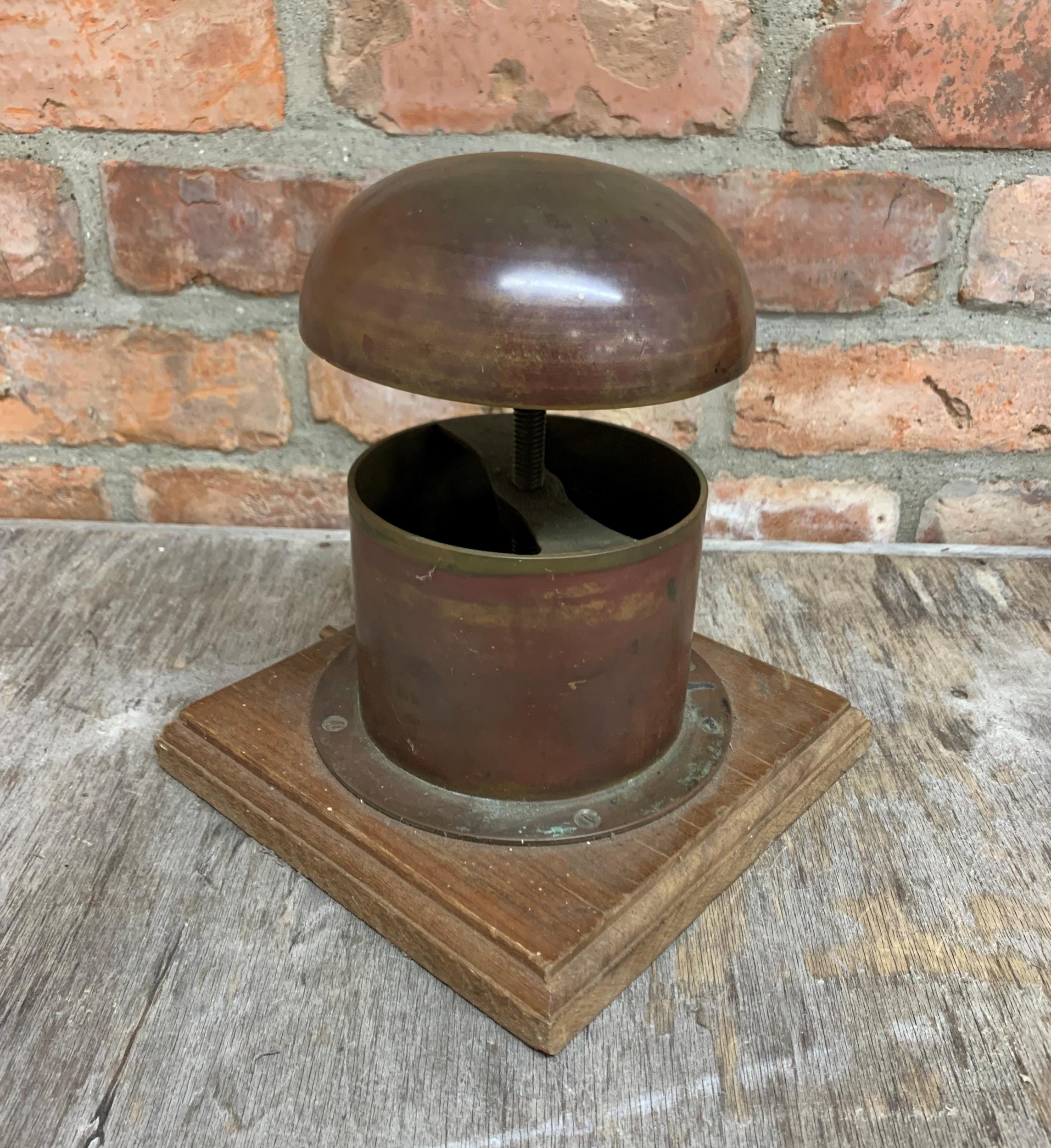 Antique copper bowler hat shaper mould on wooden base, H 27cm