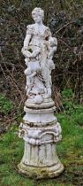 Painted three piece reconstituted stone garden statue of a seated lady holding a basket surrounded