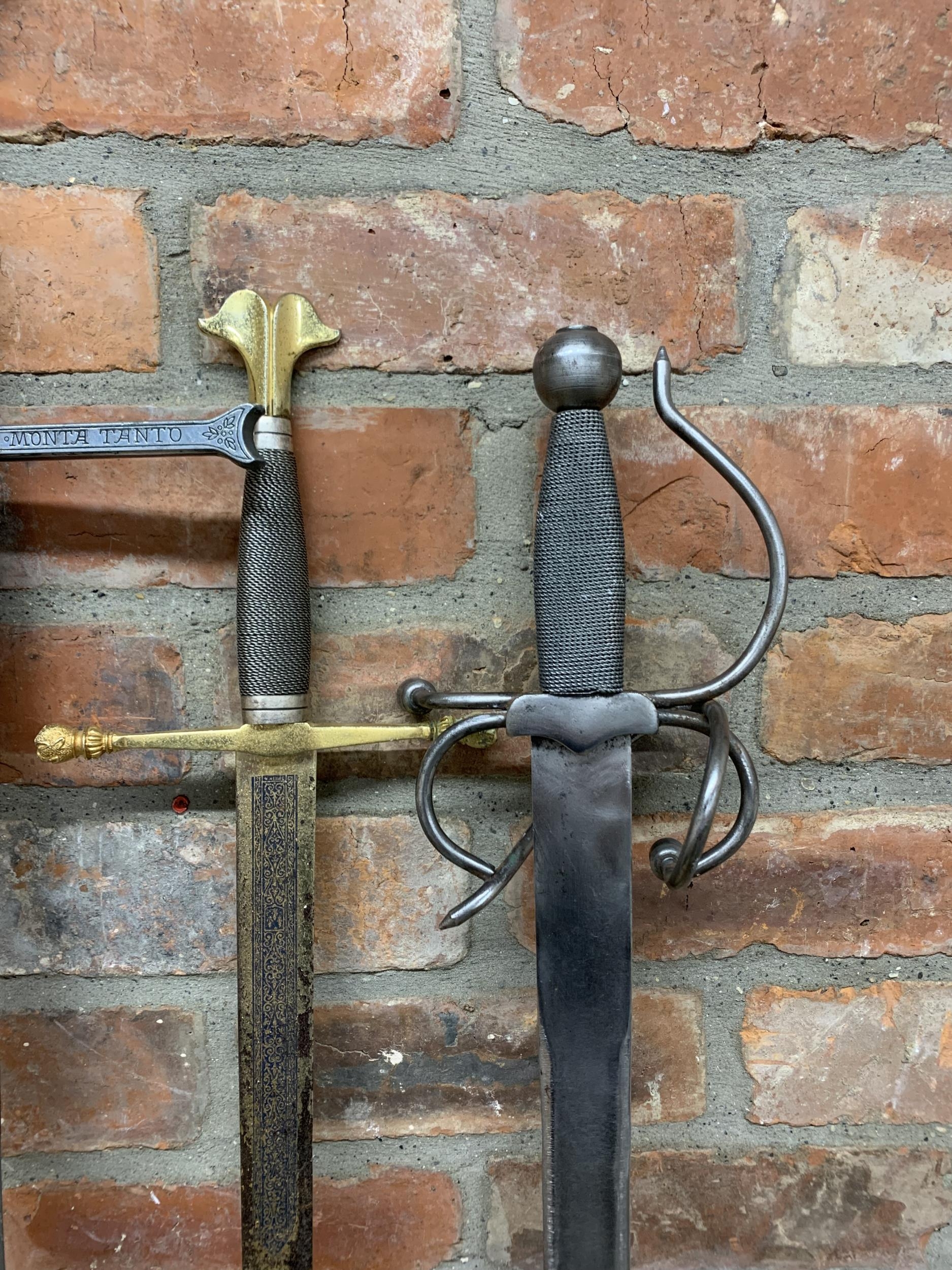 Four replica broadswords / claymores, one marked 'Toledo made in Spain' together with a replica ' - Image 3 of 4