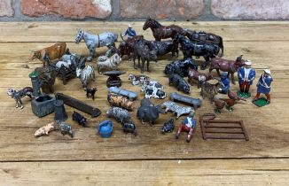 Quantity of vintage Britain's lead farm animals and accessories