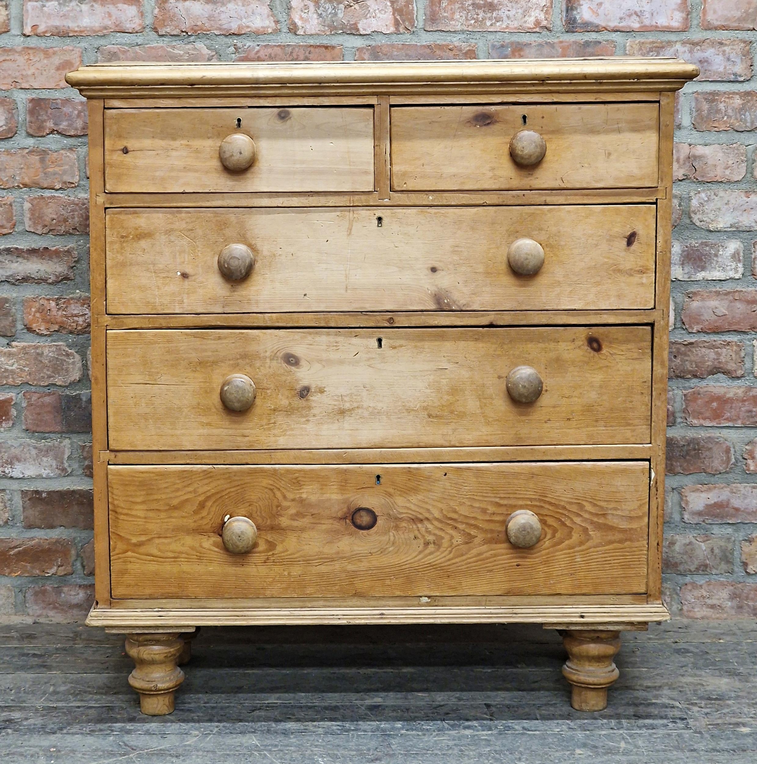 Victorian stripped pine chest of two short over three long drawers with turned wooden handles and