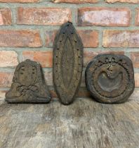 Quantity of early carved wood primitive biscuit moulds, Largest W 36cm (3)