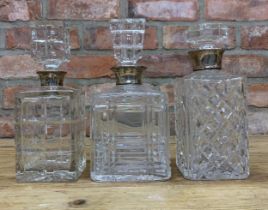 Three silver collared cut glass decanters (3)