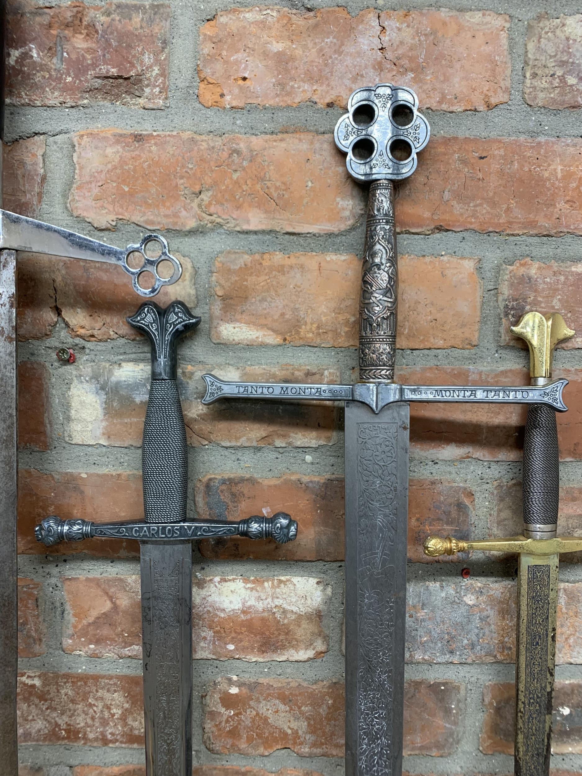 Four replica broadswords / claymores, one marked 'Toledo made in Spain' together with a replica ' - Image 2 of 4