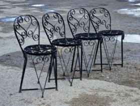 A set of four painted iron garden chairs with scrollwork detail, H 81cm (4)