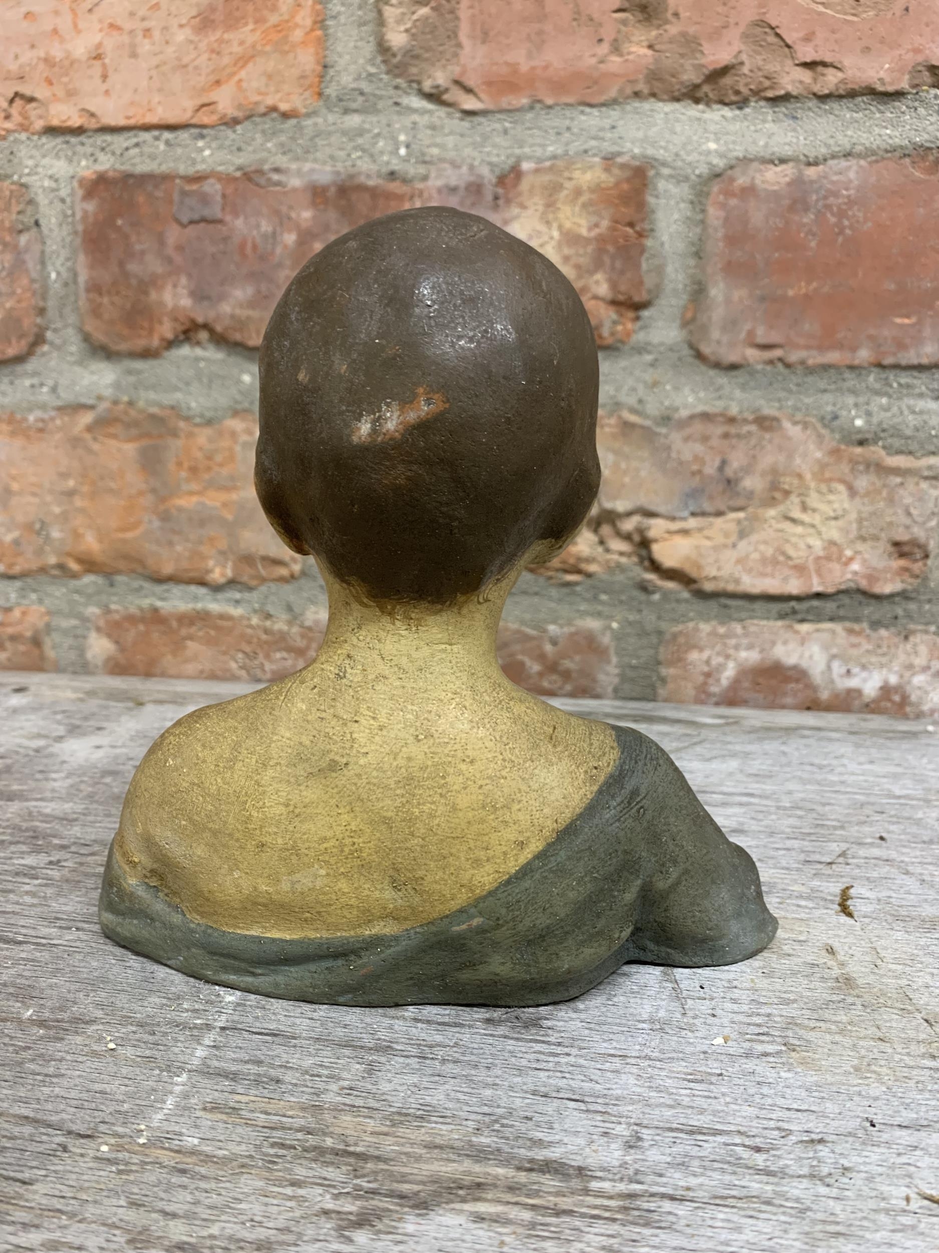 Early 20th century painted terracotta bust of a young boy, unsigned, 16cm high - Image 3 of 3