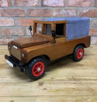 Large scratch built wooden Land Rover with canvas top and rubber tyre finish, H 26cm x L 51cm