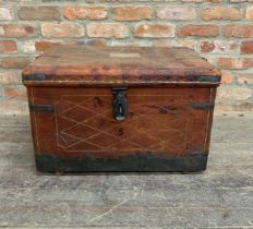 Antique leather bound trunk with metal banding, paper label signed 'Brigadier A. J. Farfan' and twin