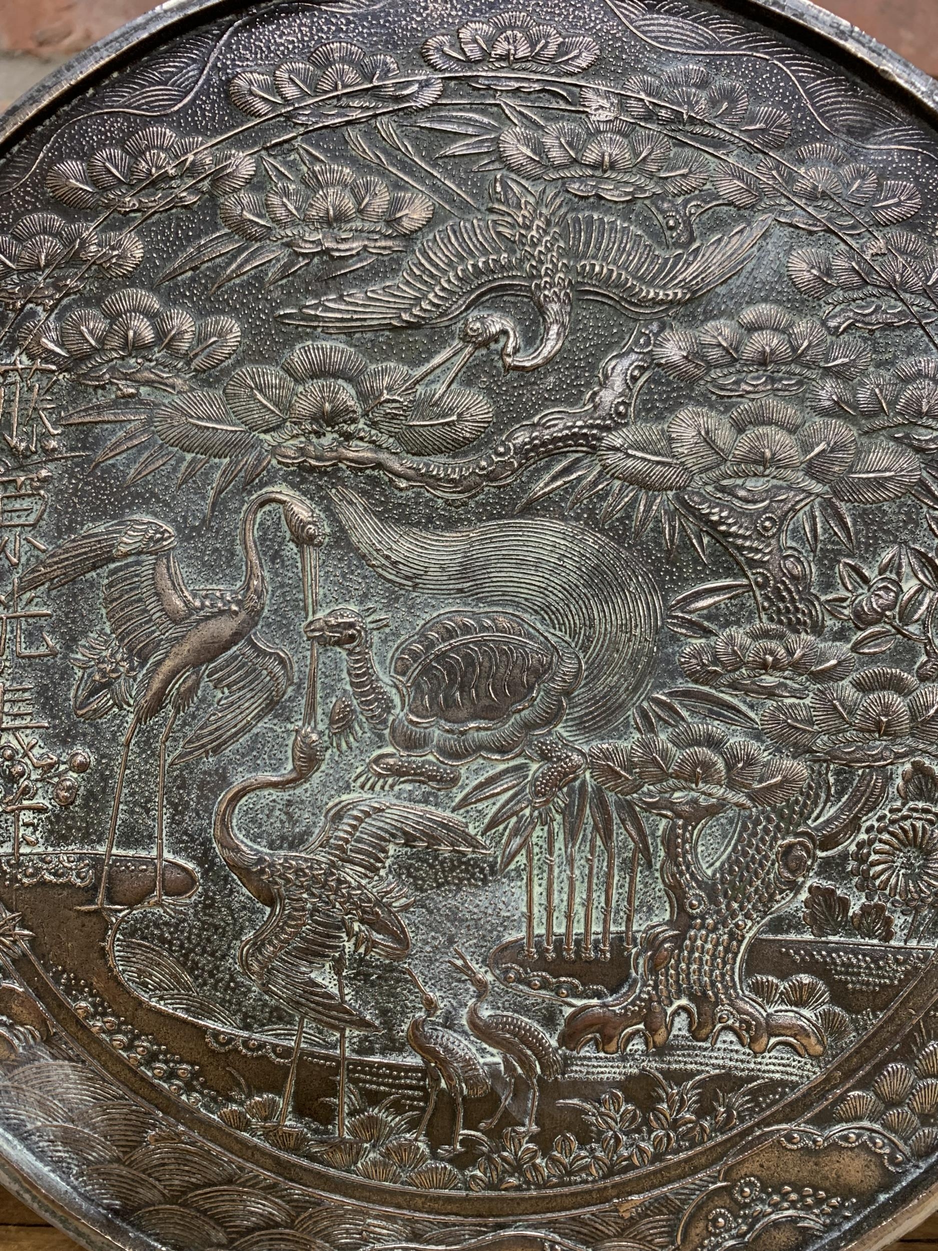 Japanese bronze mirror back with ornate crane and floral detailing, late Edo period produced by - Image 2 of 3