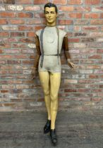Vintage French plaster and wood mannequin with articulated arms and torso, indistinctly signed, H