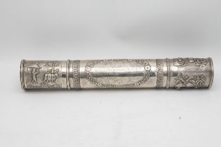 Indian white metal scroll case, embossed with exotic scenes and foliage, inscribed 'Presented to Rev