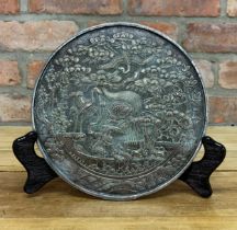 Japanese bronze mirror back with ornate crane and floral detailing, late Edo period produced by