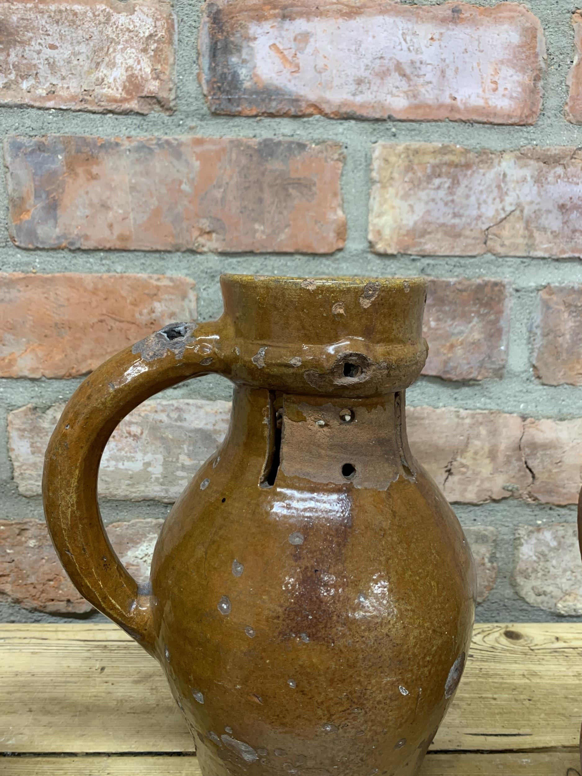 Four antique 18th Somerset glazed earthenware pitcher jugs with additional glazed puzzle jug - Image 4 of 5