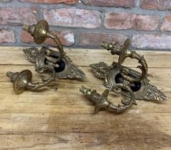 Pair of Regency style gilt cast metal twin branched wall sconce lights, wreath top and scrolled