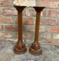 Pair of Kenneth Turner beehive design contemporary candlesticks, H 42cm