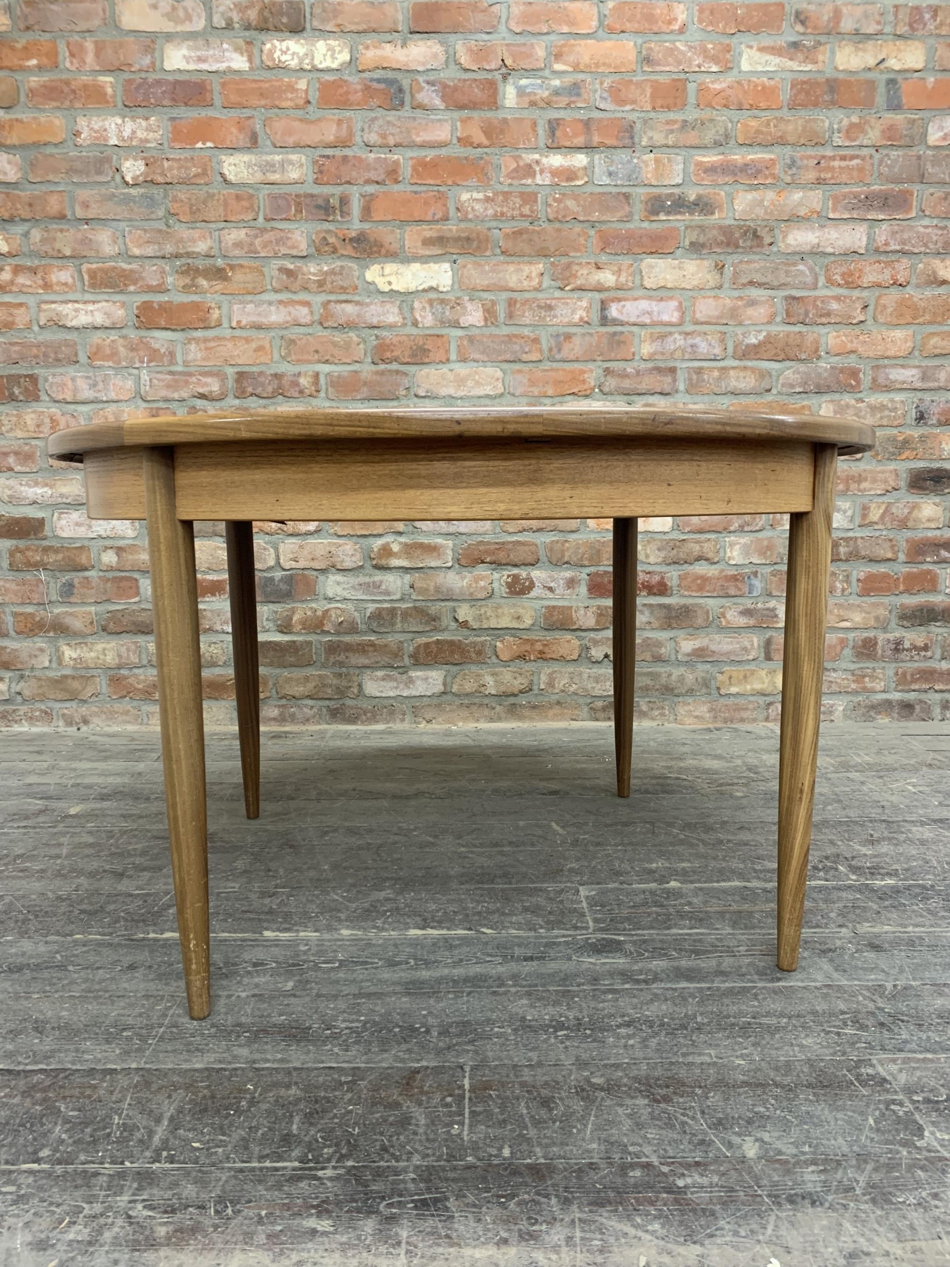 Mid 20th century G Plan teak circular extending dining table together with four chairs, H 73cm x W - Image 3 of 7