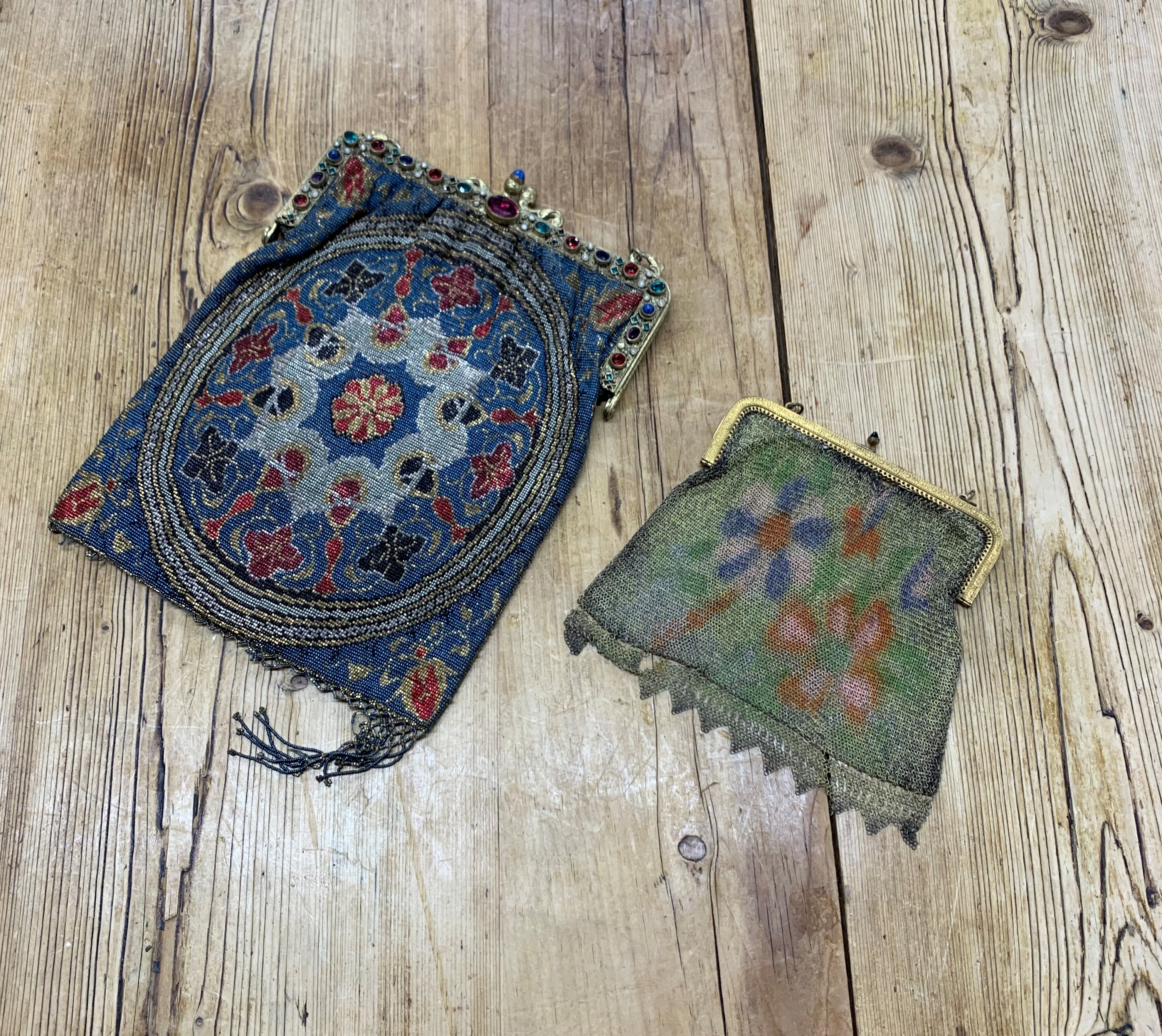 Early 20th century evening chain purses with floral design to include gemstone adorned example (2)