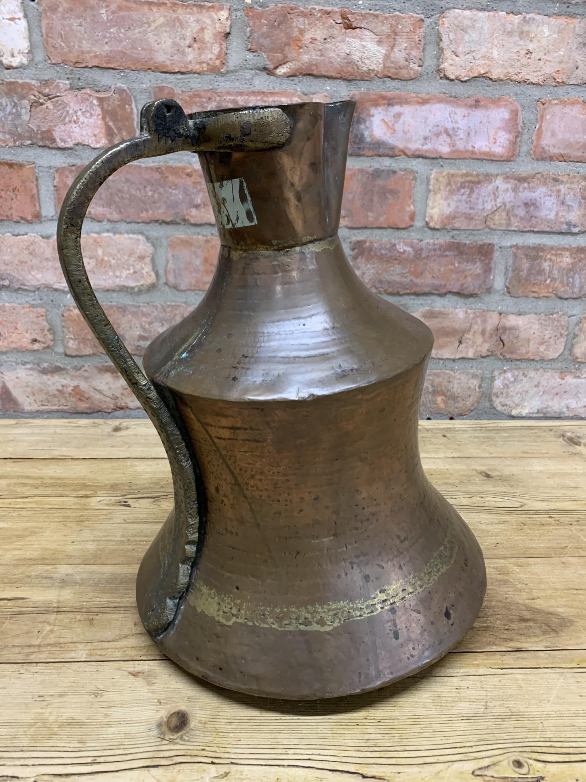 Large early Persian copper ewer with cast brass handle, 39cm high - Image 2 of 4
