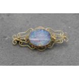 Antique 9ct opal doublet brooch, the stone 15 x 20mm. 4g
