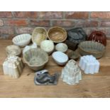 Large collection of ceramic and metal jelly moulds (18)