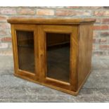 19th century satin walnut table top display cabinet, the twin glazed doors enclosing a shelved