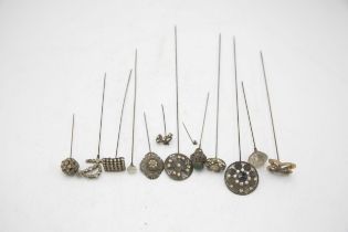 Collection of pierced and paste decorated hat pins (13)