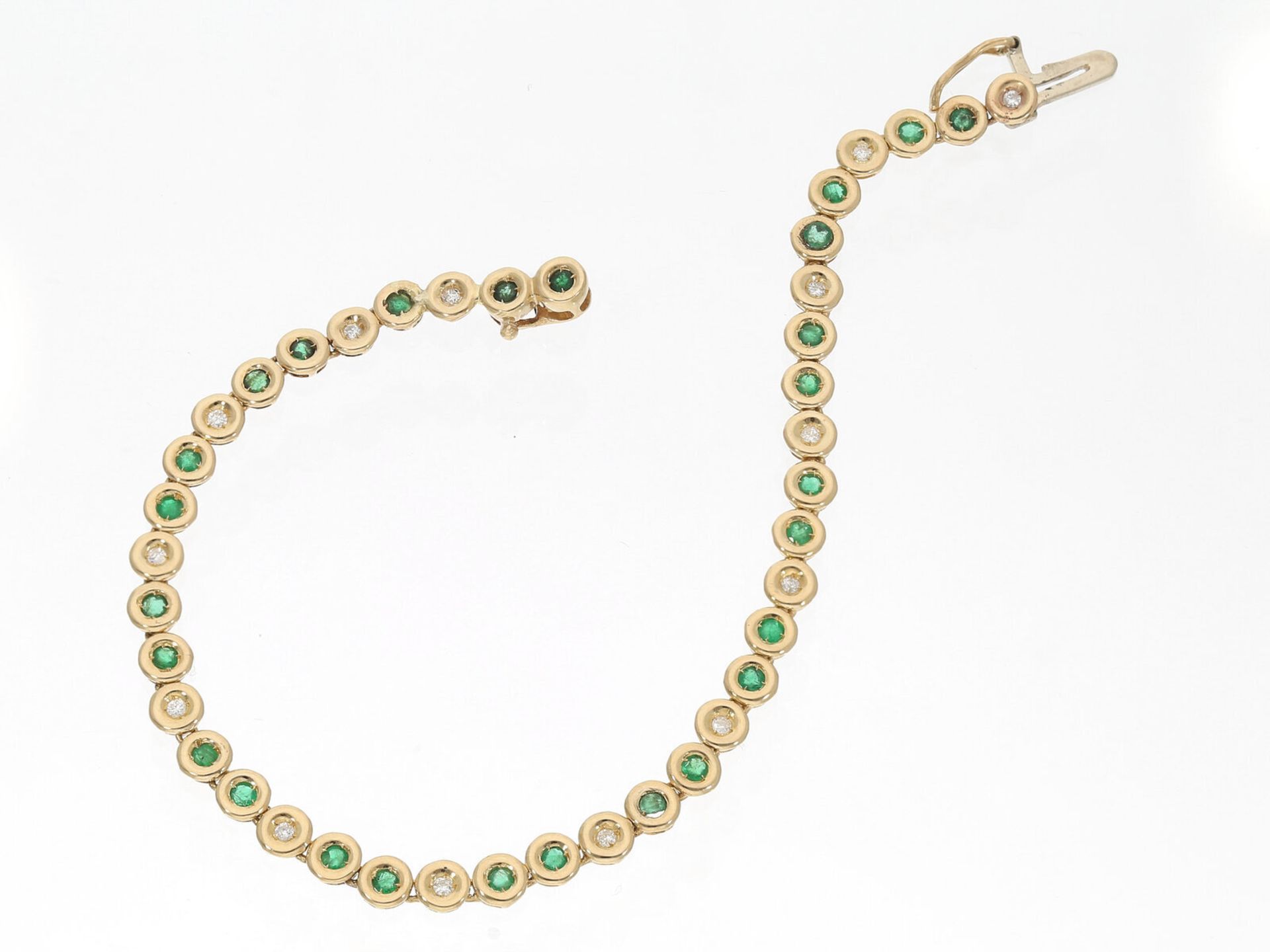 Zierliches goldenes Tennis-Armband mit Smaragd- und Brillantbesatz, 18K Gold