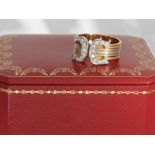 Rings: high-quality, formerly very expensive tricolour ladies' ring by Cartier with brilliant-cut di
