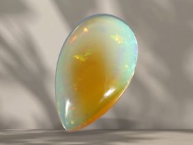 Opal von ca. 30ct in Tropfenform mit interessantem Farbspiel