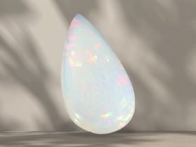 Opal: Schöner Opal-Cabochon in Tropfenform und mit feinem Farbspiel , ca. 17,25ct