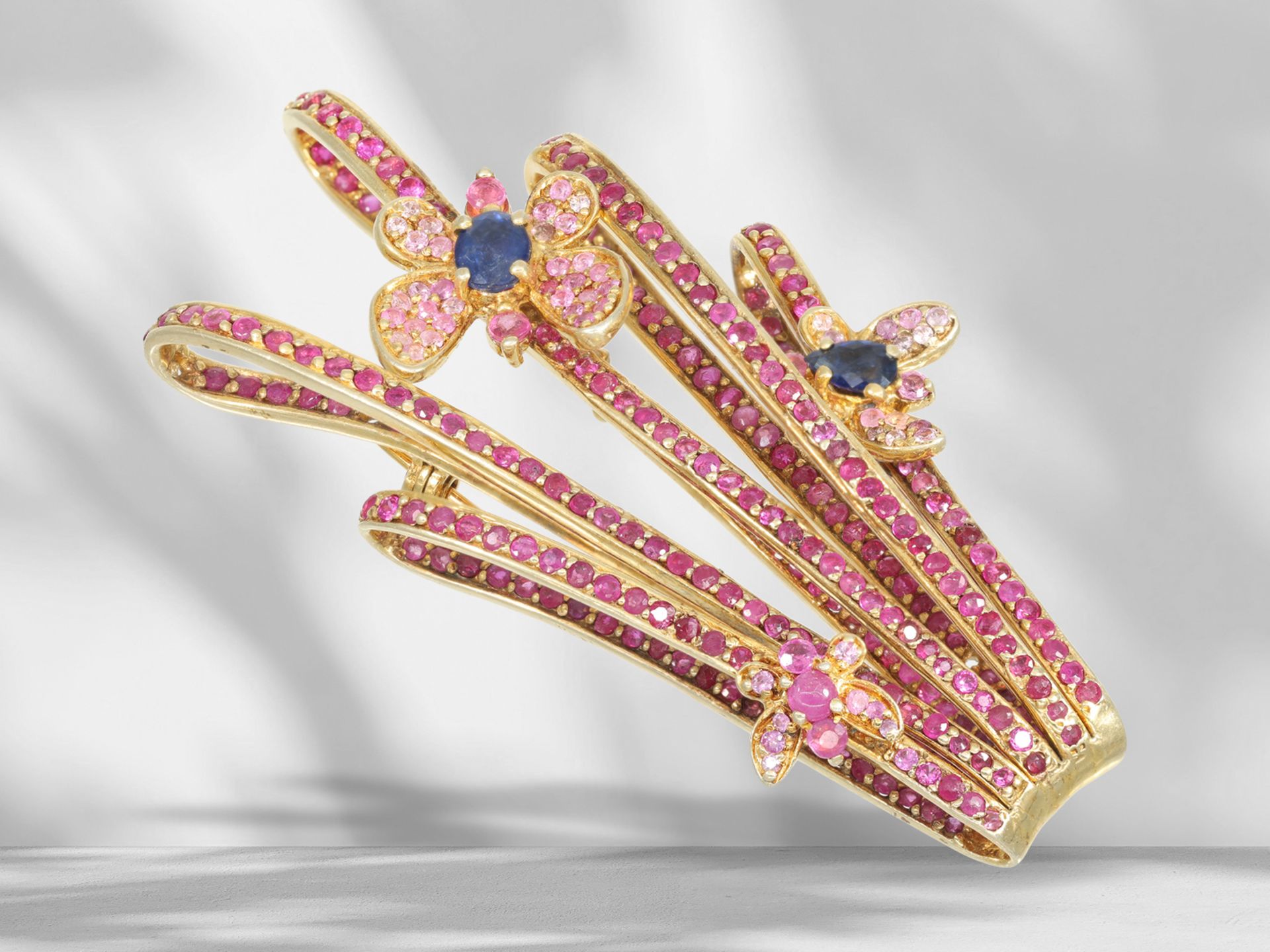Extremely decorative designer brooch with sapphires and rubies, handmade from 925 silver gilt