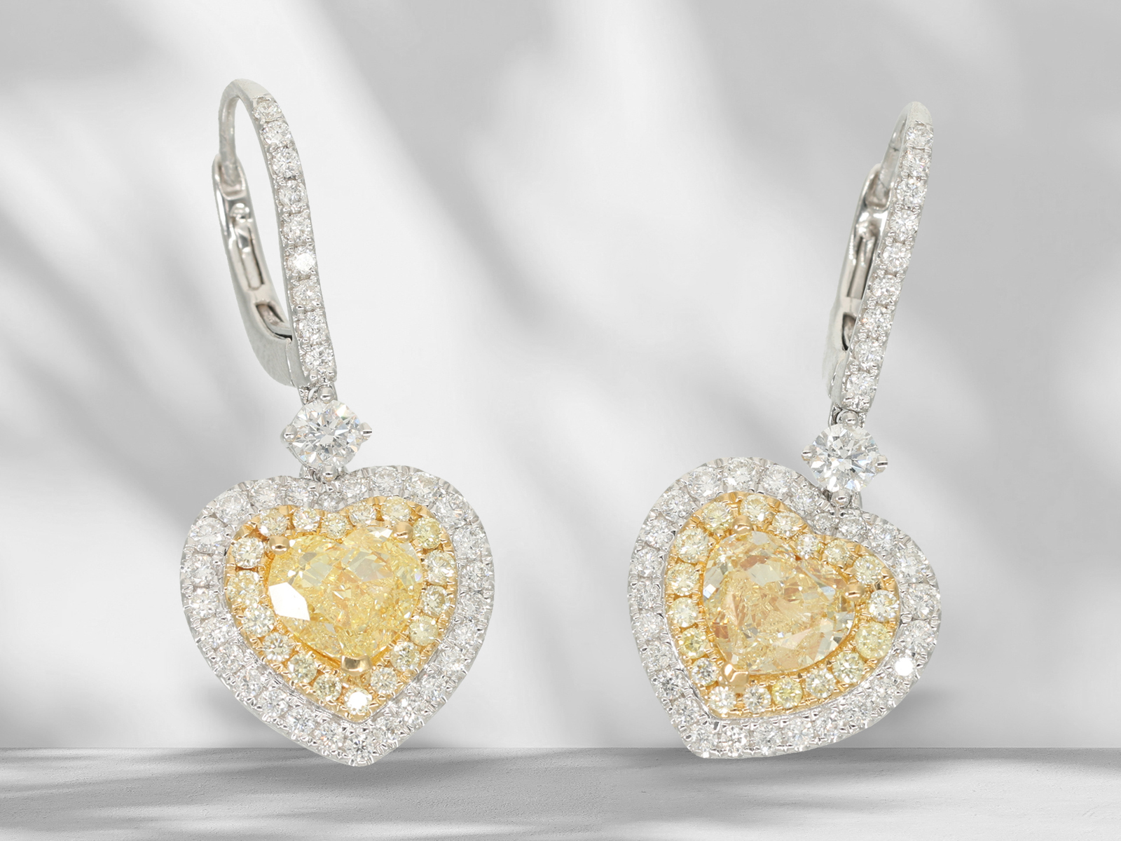 Earrings: High quality earrings set with brilliant-cut diamonds, 2 x 1ct fancy light yellow