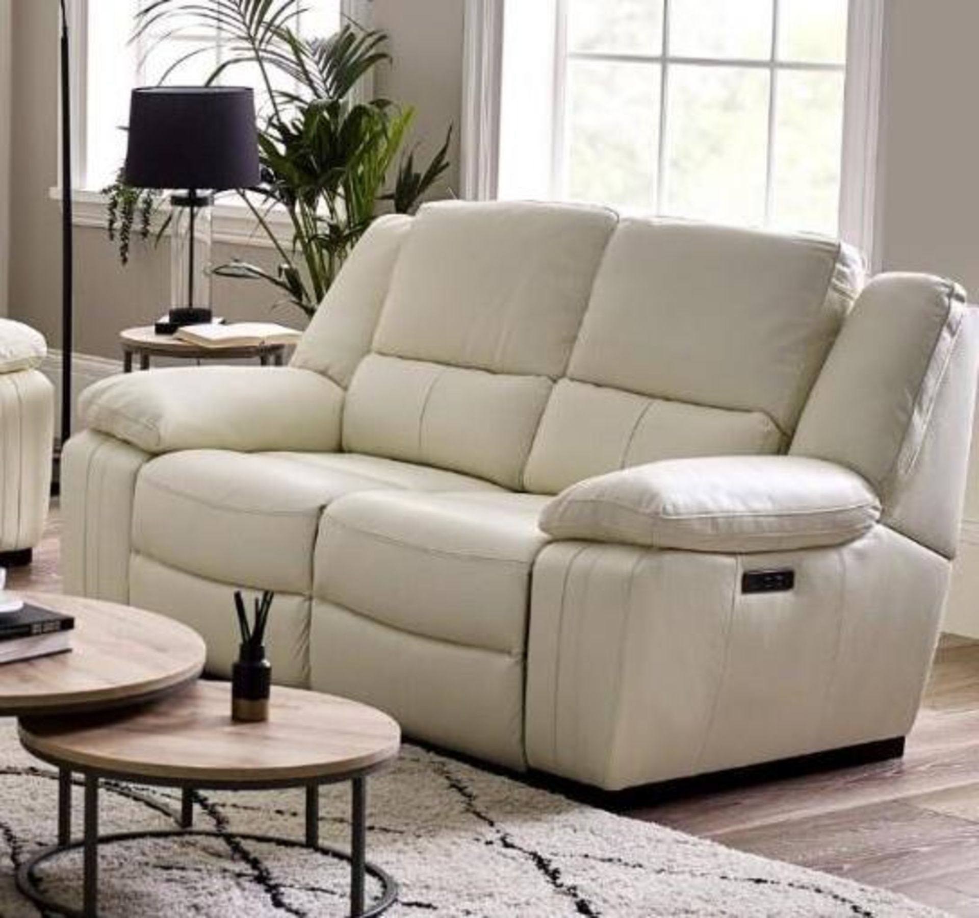 Brand new and boxed SCS Fallon 2 seater electric reclining sofa in Cream.
