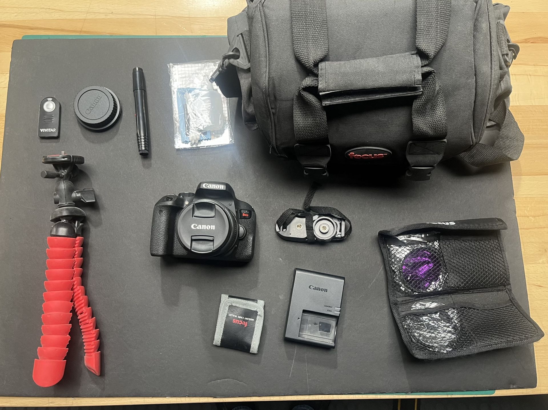 Cannon EOS Rebel T7i, Camera + Bag + Tripod and more, per seller excellent-fully functional