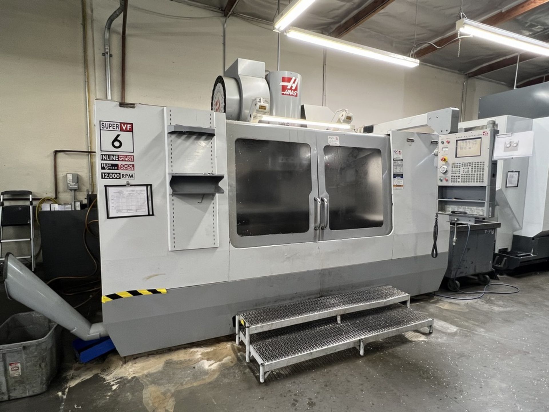 2005 Haas VF-6SS Vertical Machining Center, Renishaw Probe, Auger, 12K RPM, 24 Tool Side Mount,