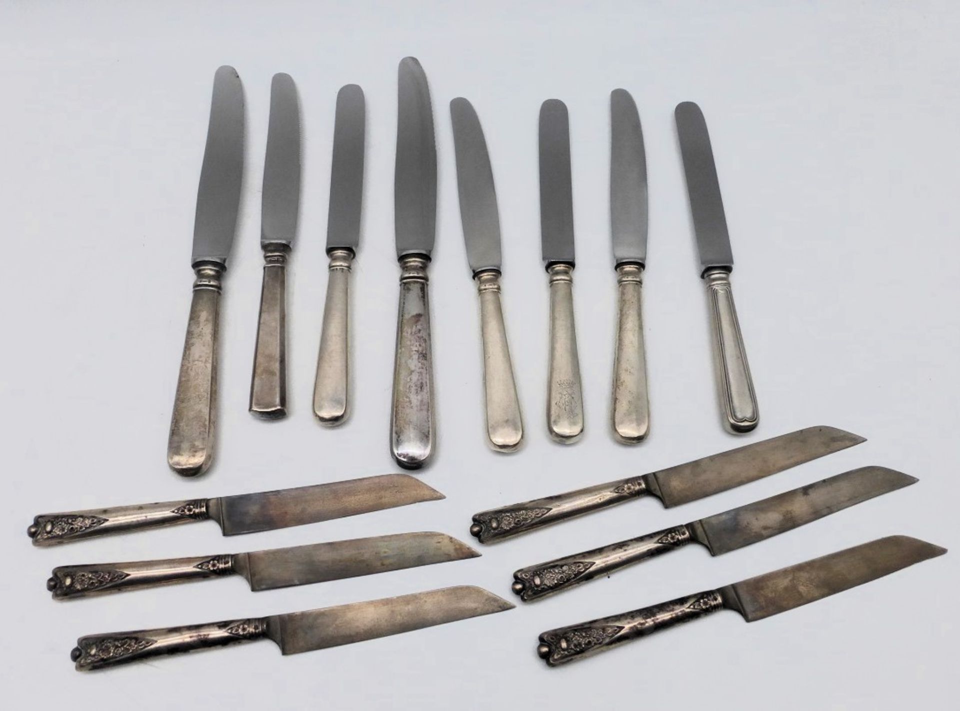 14 Messer mit Silbergriff